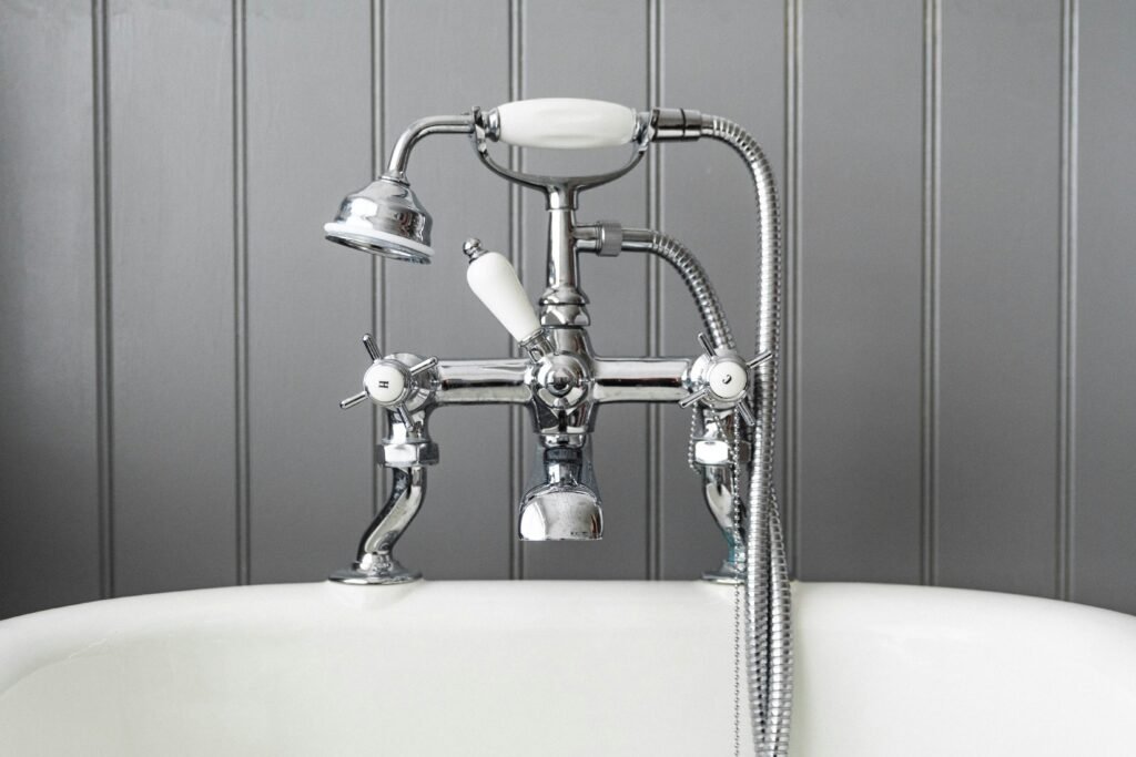 How to Fix Low Water Pressure in House covering plumbing troubleshooting, faucet aerators, water leaks, pipe problems, pressure testing, and improved flow.