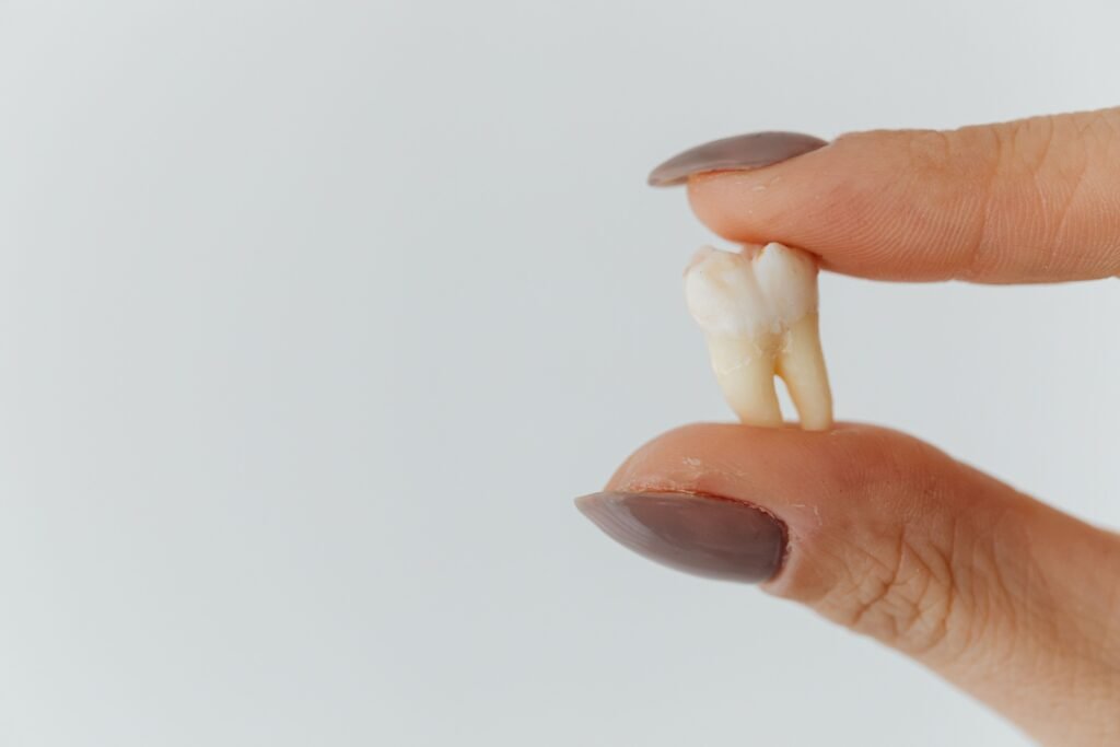 How to get a tooth out fast and painless child using safe dental care tips