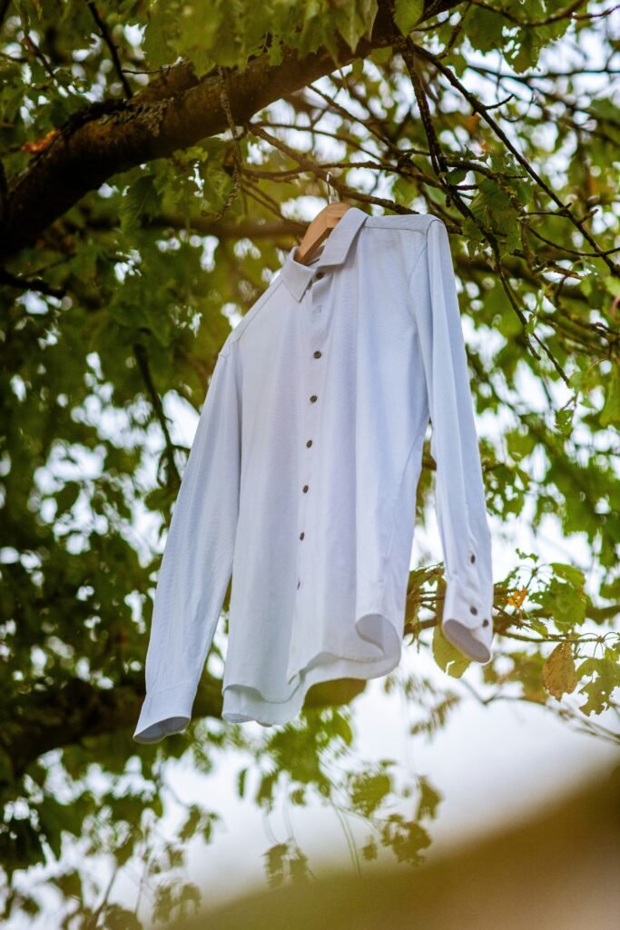 How to Get Yellow Stains Out of White Shirts Expert Removal Guide covering yellow stains, sweat marks, deodorant buildup, washing methods, and shirt care.